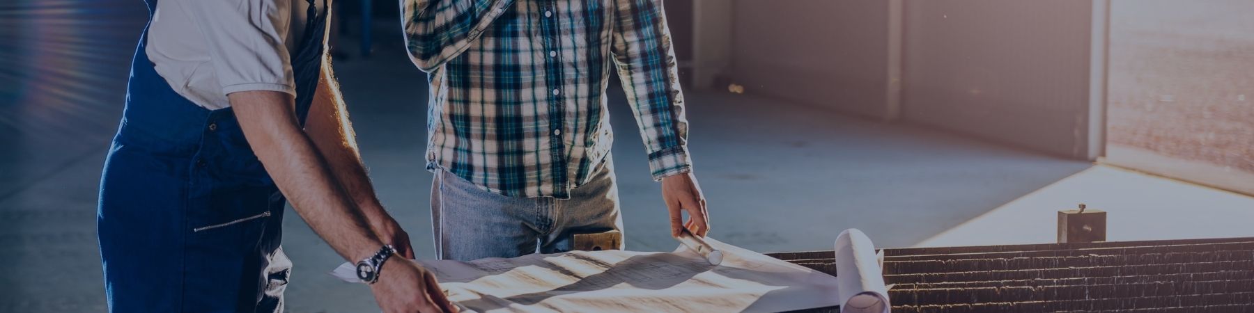 People looking over plans